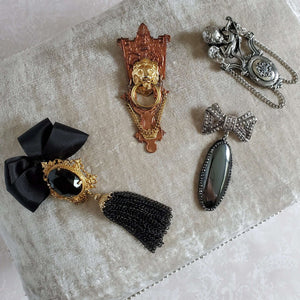 Romance and Ruin brooch collection 