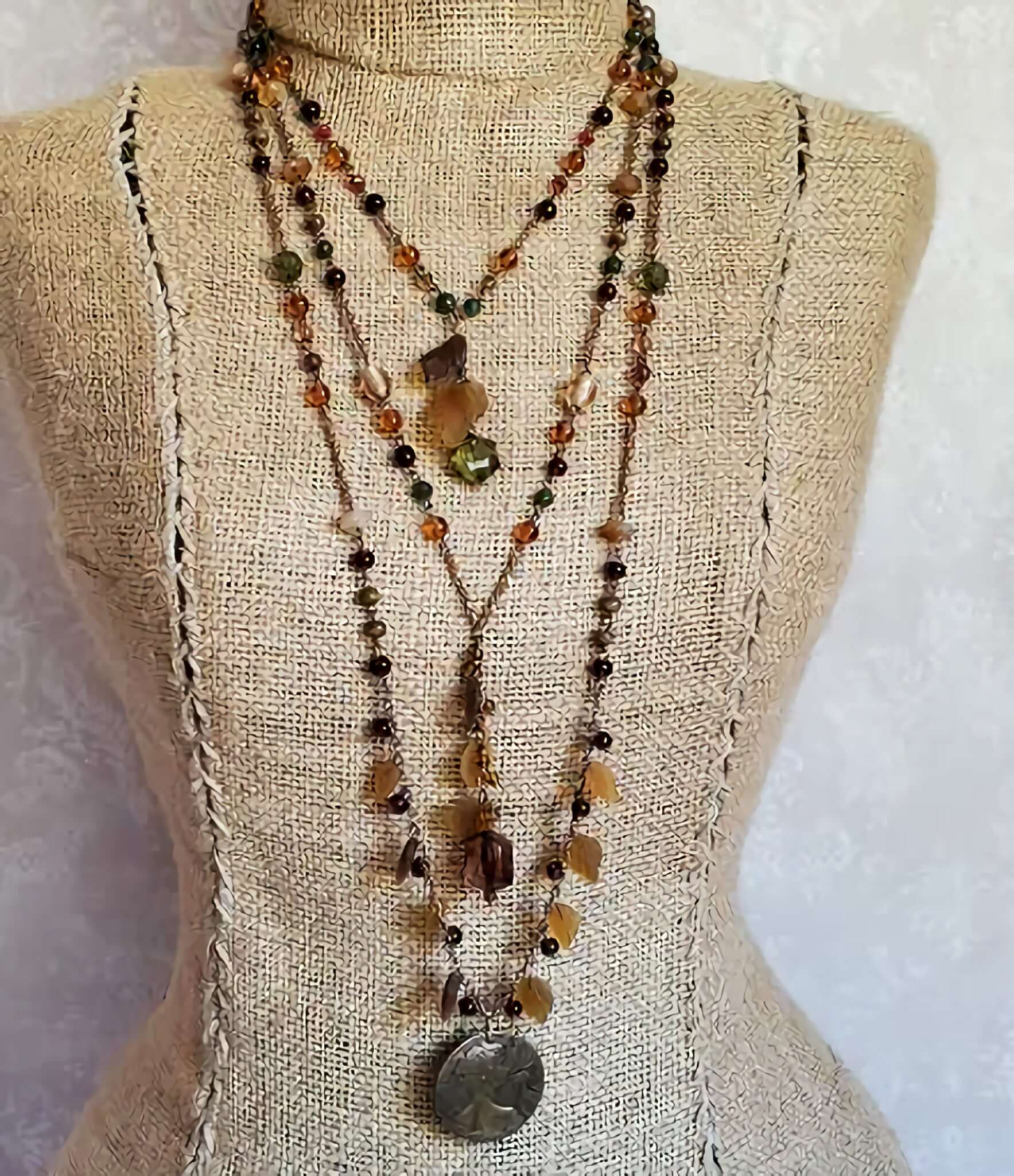 Three Strand Necklace with Brown, Green, Gold, Orange and Red Beads