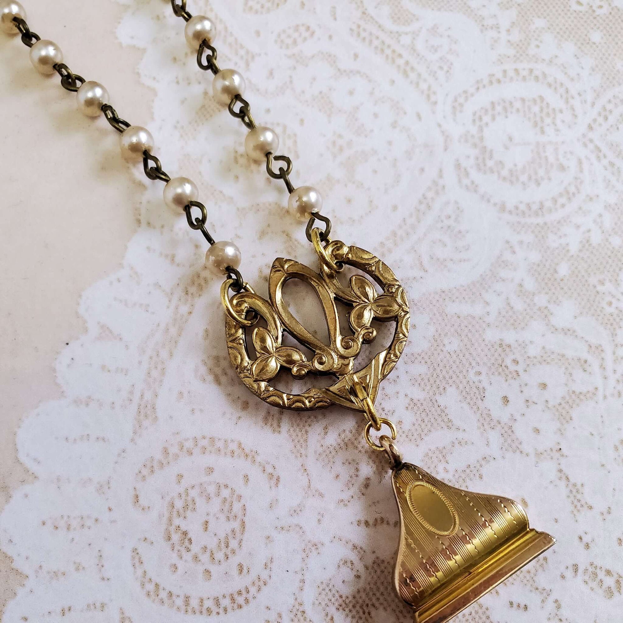 Dual Pendant featuring Brass Floral Filigree Pendant and Antique Fob