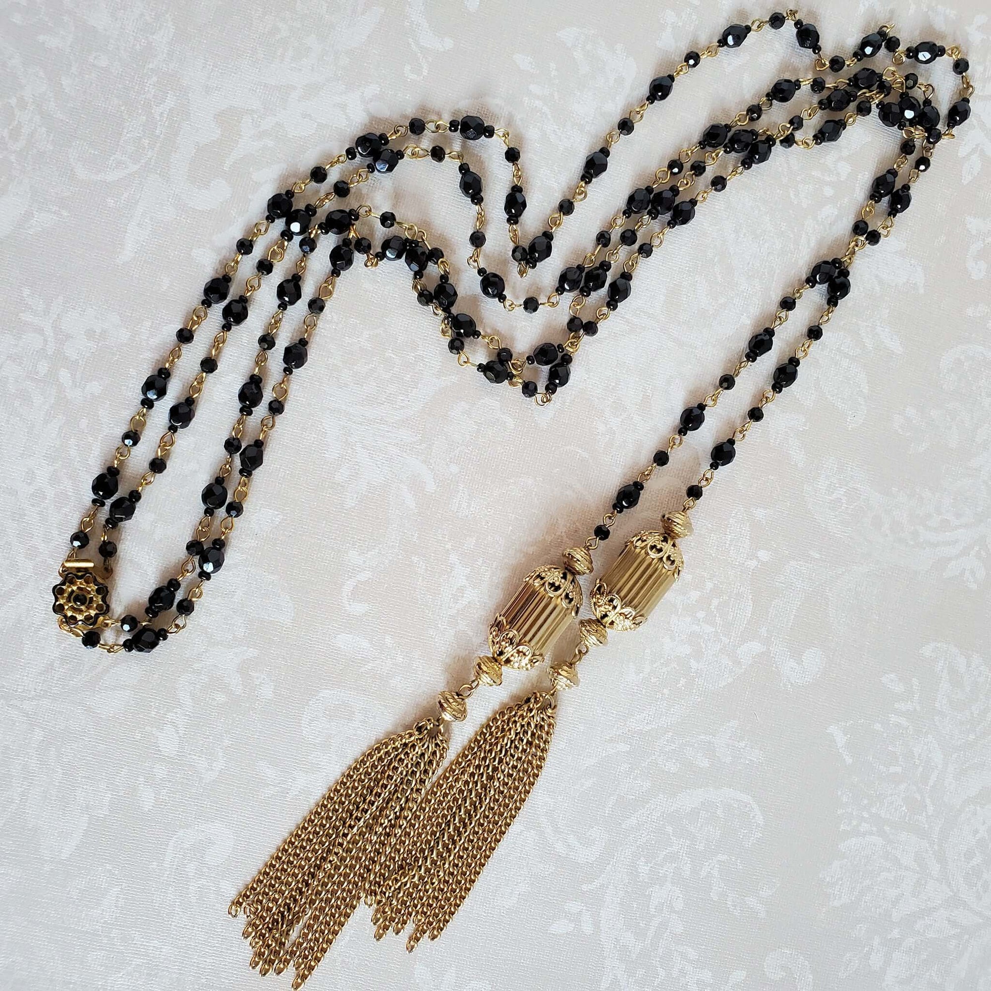 Tow Strand Black Bead Necklace with Gold Tassels