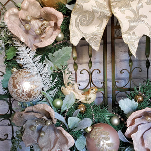 Artificial Christmas Wreath Detail showing Pink Florals, Pink, Ivory and Gold MIni Ornaments and White Sparkling Fern Leaves