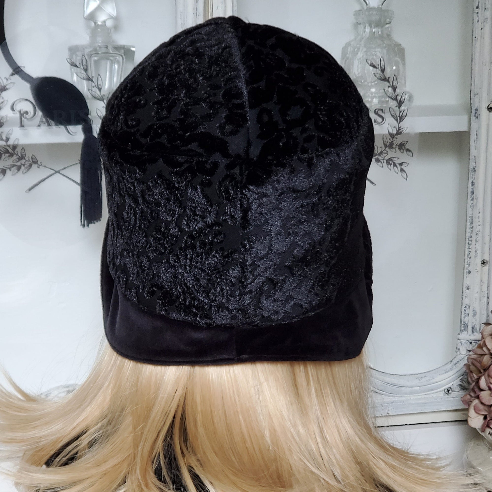 Rear view of a 1920s Cloche Hat with rear center seams.