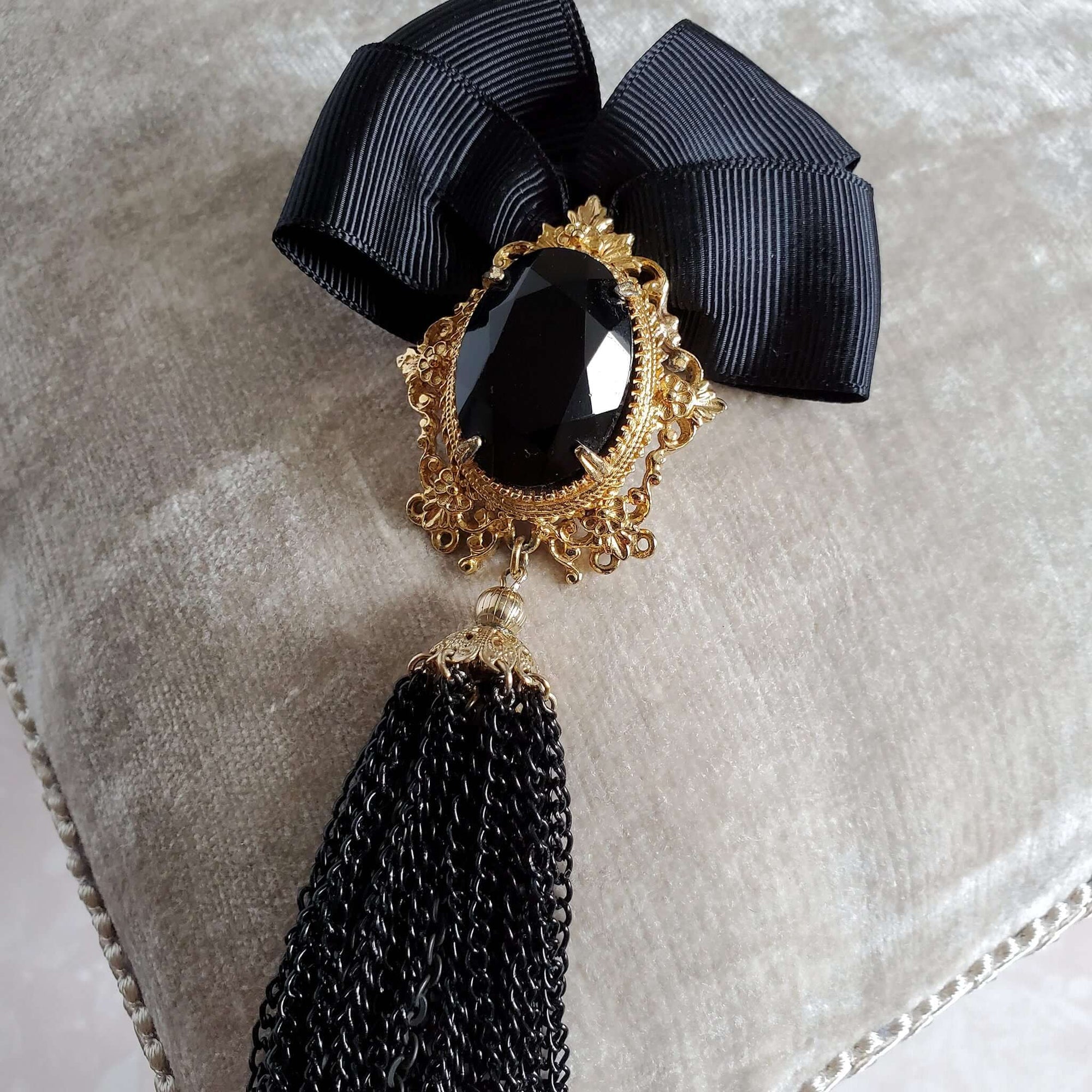 Designer black and gold, Victorian inspired brooch.