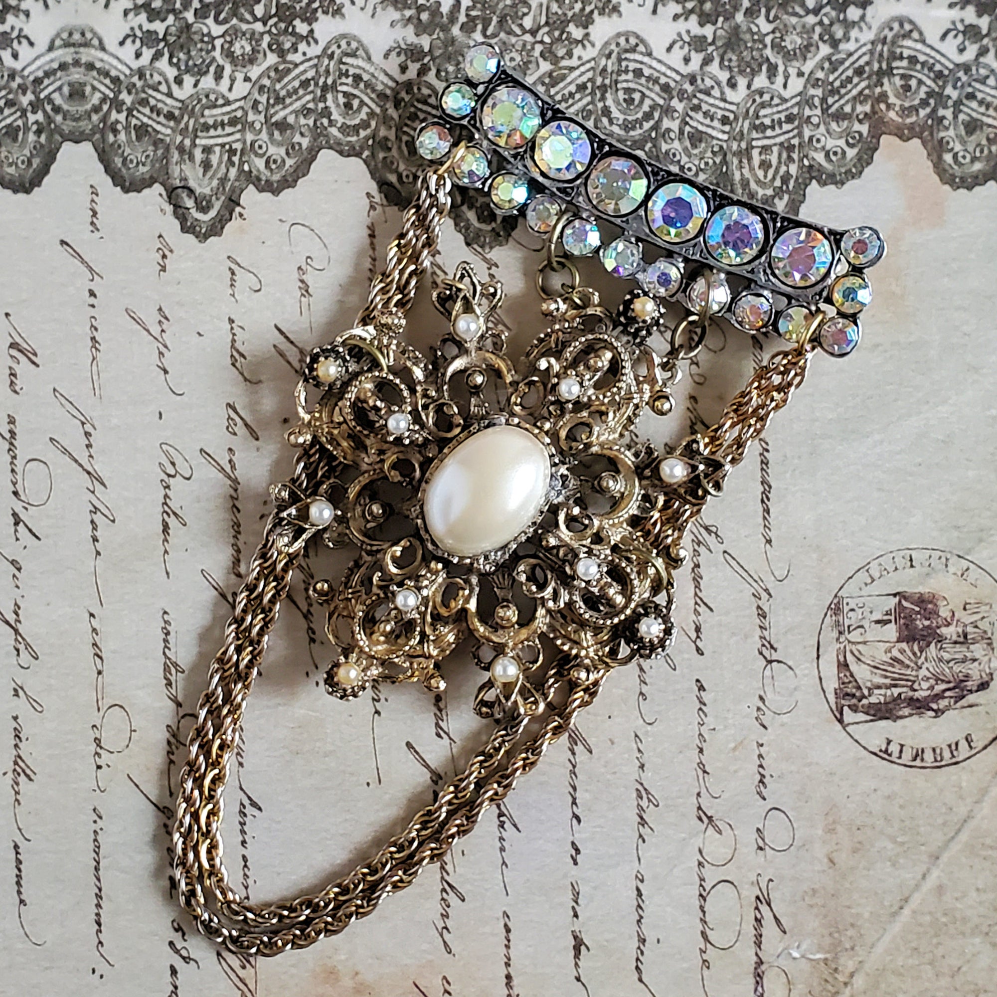 Victorian Style Brooch with a Sparkling topper bar pin , Victoria Cross style pendant and finished with a vintage chain swag.