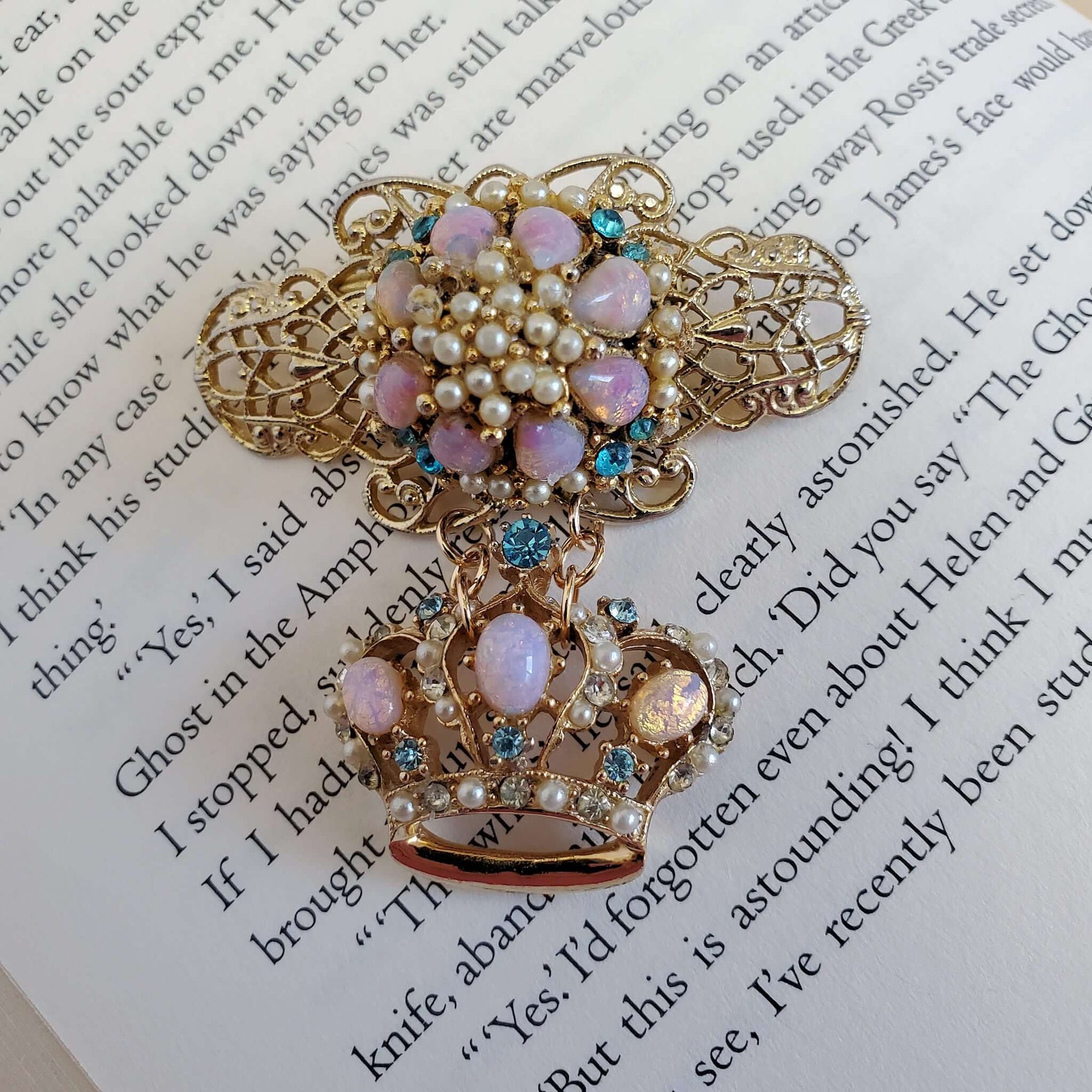 A colourful coat pin brooch