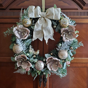 Designer Wreath Displayed On Wood Armoire