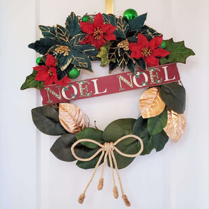 Top is decorated with Dark Red and Green Poinsettias with a collection of bright green ornaments.
