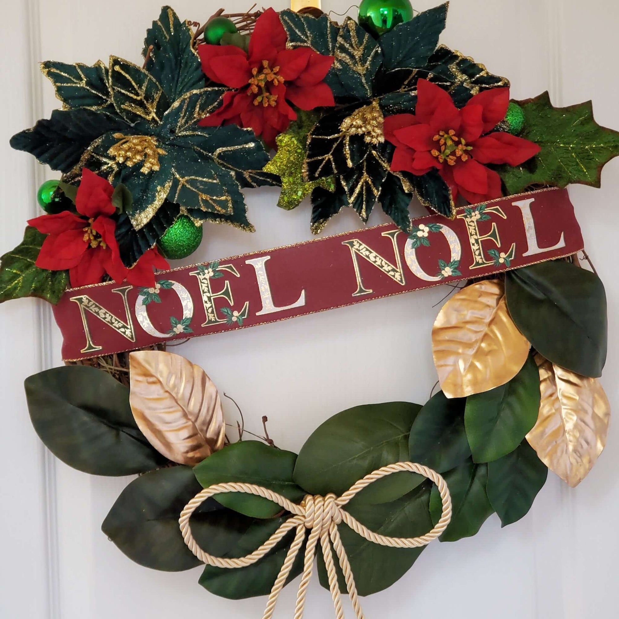 Grapevine Wreath with a NOEL banner Ribbon