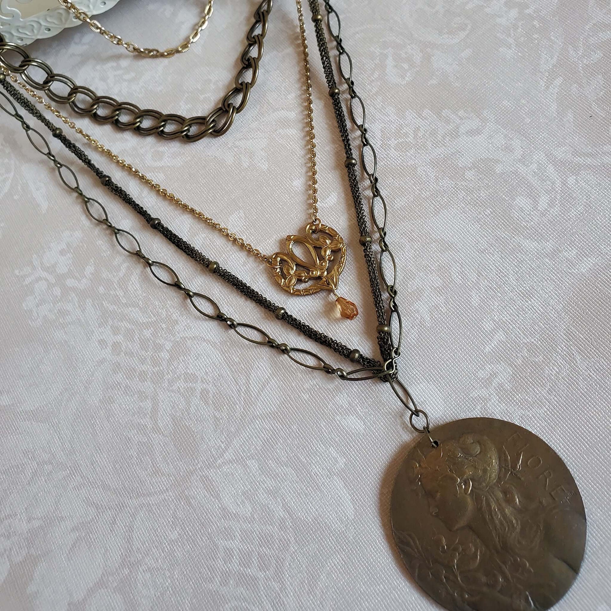 Dual Pendant Necklace with Brass Charm and Goddess Medallion