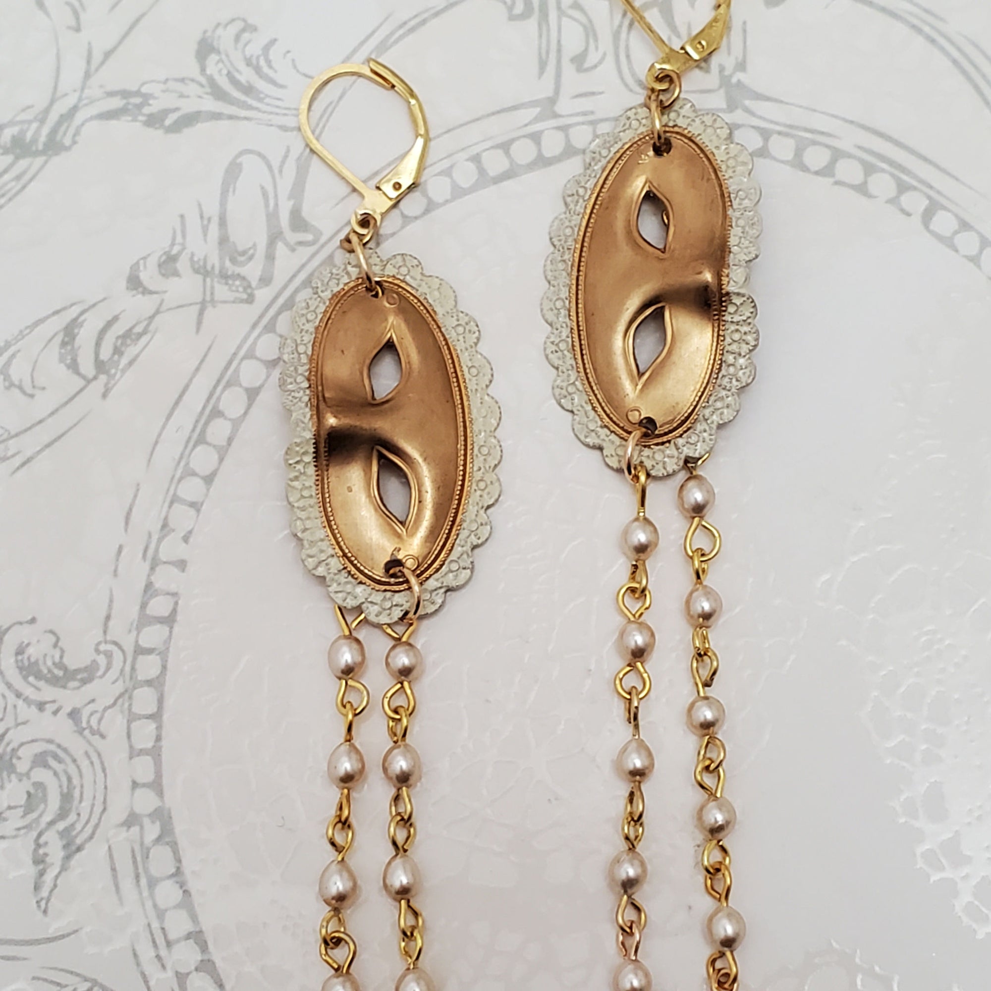Hand painted brass Masquerade mask earrings with pearl chain drops and lever back earring hooks