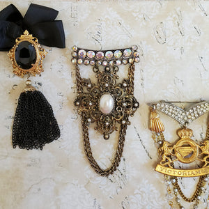 Collection of Romance and Ruin brooches