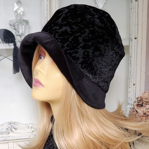 Winter hat and scarf set including a cloche hat and reversible scarf.