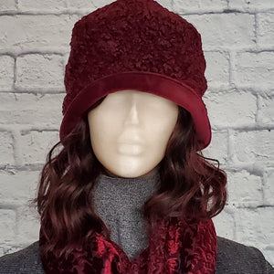 Burgundy Persian lamb cloche has an adjustable brim which can be turned up.
