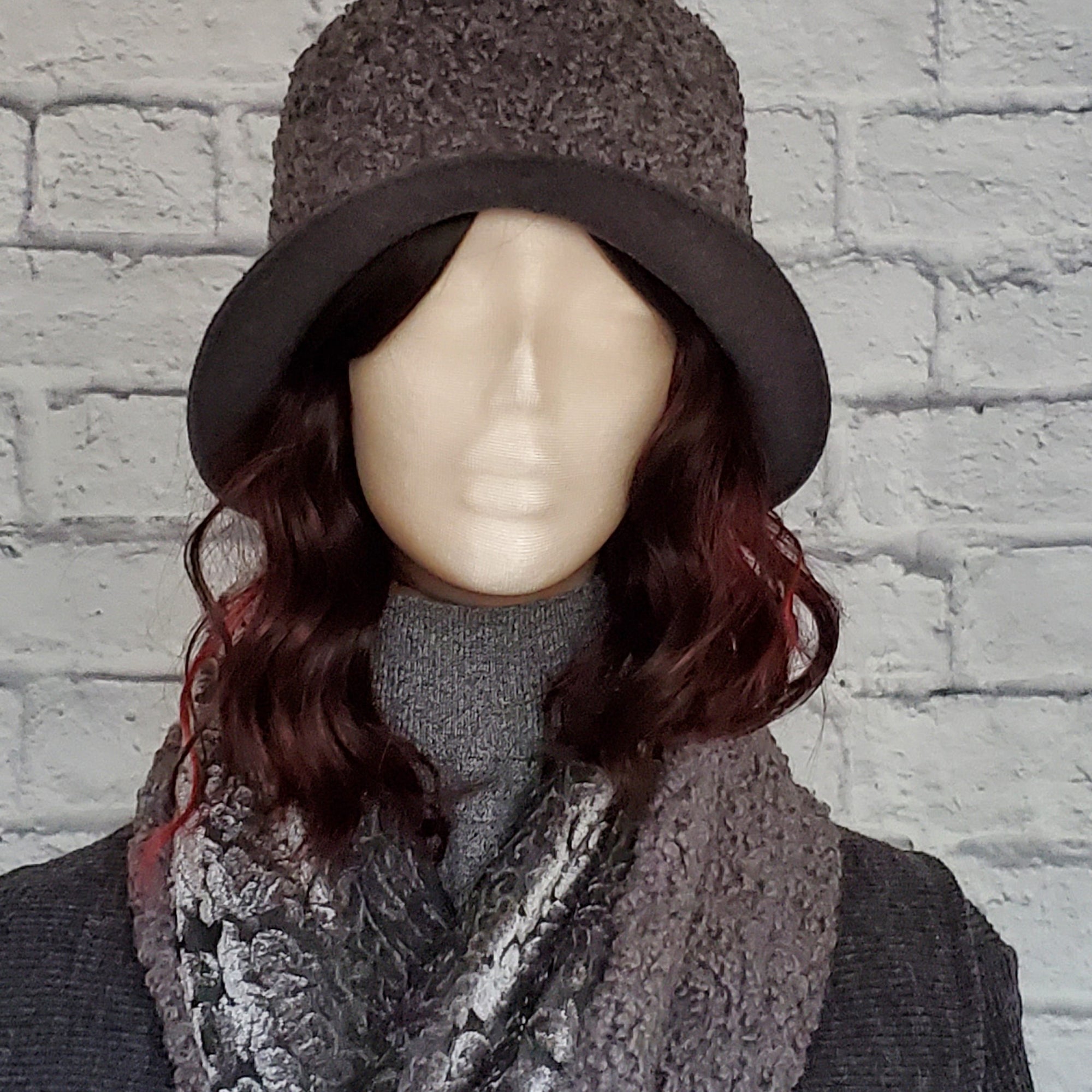 Faux Persion Lamb Cloche with a grey wool brim. Set includes a  matching scarf. One side of scarf is finished in a faux Persian lamb with a velvet damask fabric on the reverse side.